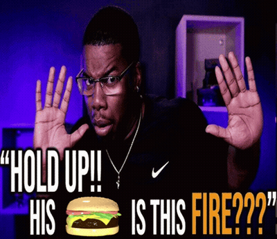 Man With Glasses Holding Up Hands In Front Of Hamburger Saying Hold Up GIF