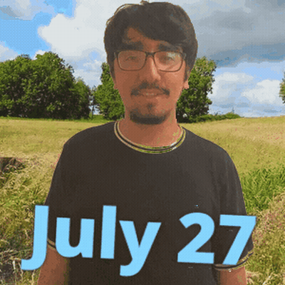 Man With Glasses In Field July 27 GIF