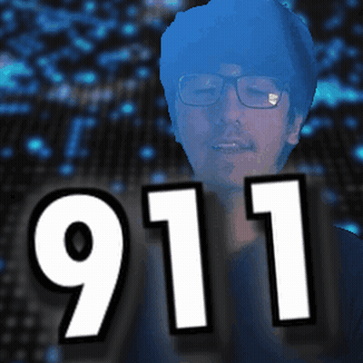 Man With Glasses In Front Of 911 Sign GIF