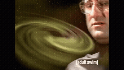 Man With Glasses In Front Of Green Adult Swim Swirl GIF