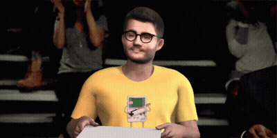 Man With Glasses In Yellow Shirt With Game Boy GIF