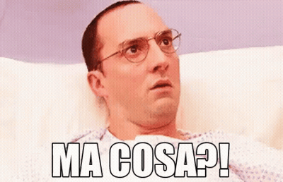 Man With Glasses Laying In Hospital Bed Ma Cosa GIF