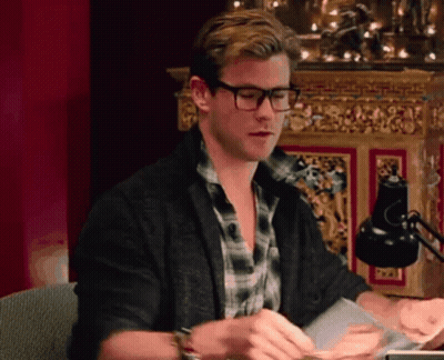 Man With Glasses Looking On Couch GIF