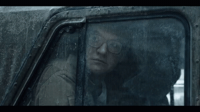 Man With Glasses Looking Out Car Window GIF