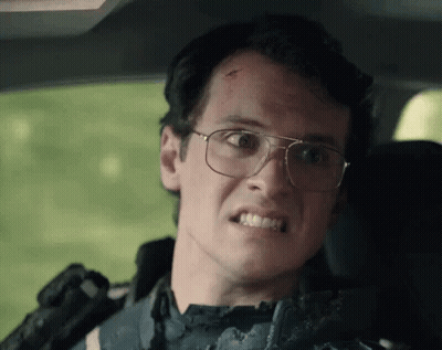 Man With Glasses Making Funny Face In Car GIF