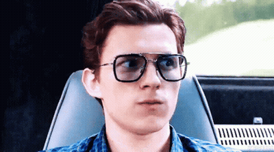Man With Glasses Making Funny Face in Car