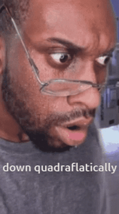 Man With Glasses Making Funny Face Says Down Quadratically GIF