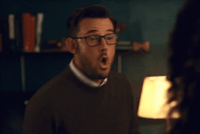 Man With Glasses Making Funny Face With Hands GIF