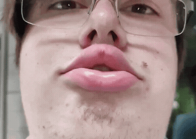 Man With Glasses Making Funny Face GIF
