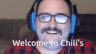 Man With Glasses Mustache And Headphones Smiling Welcome To Chili's GIF