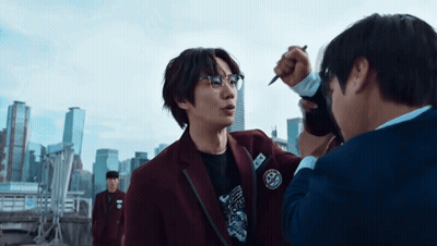 Man With Glasses Name Tag A Talking To Another GIF
