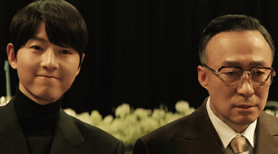 Man With Glasses Next To Another Man GIF