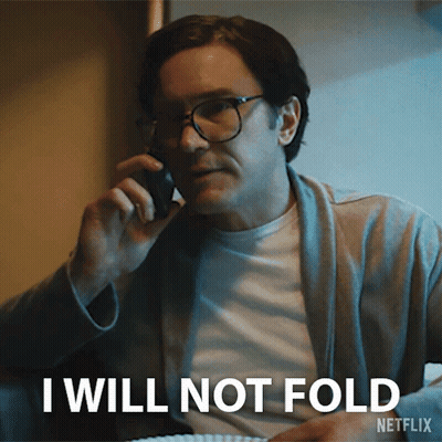Man With Glasses On Phone Saying I Will Not Fold GIF