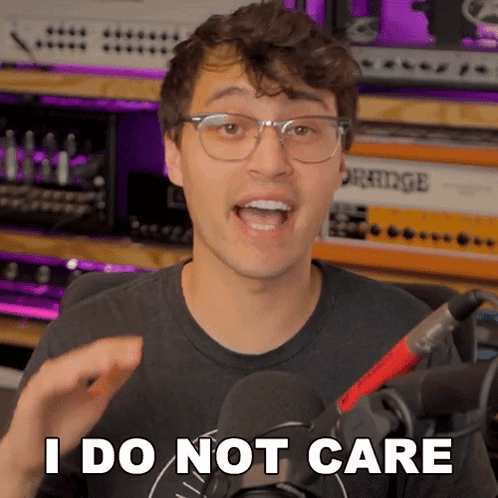 Man With Glasses Saying I Do Not Care GIF