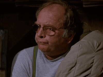 Man With Glasses Saying I Don't Know In Green Letters GIF