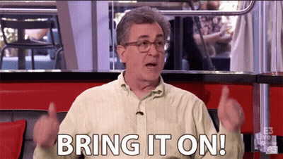 Man With Glasses Says Bring It On GIF