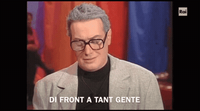 Man With Glasses Says Di Front A Tante Gente GIF