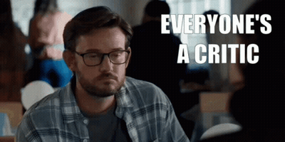 Man With Glasses Says Everyone's A Critic At Table GIF