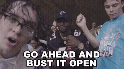 Man With Glasses Says Go Ahead And Bust It Open GIF