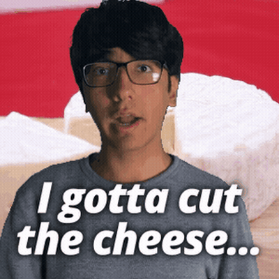 Man With Glasses Says I Gotta Cut The Cheese Next To Cheese Slice GIF