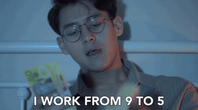 Man With Glasses Says I Work 9 To 5 Holding Box GIF