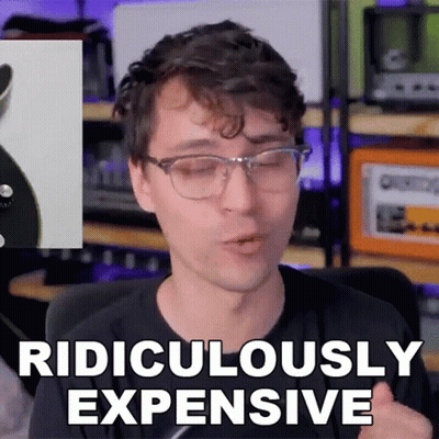 Man With Glasses Says Ridiculously Expensive In Front Of Guitar GIF