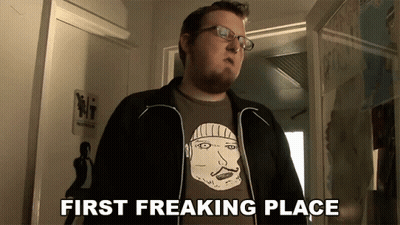 Man With Glasses Shirt Saying First Freaking Place GIF
