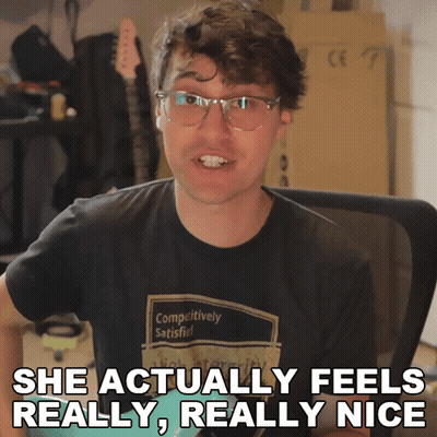 Man With Glasses Shirt Says Competitively Satisfied