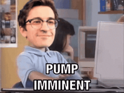 Man With Glasses Sitting at Computer Saying Pump Imminent