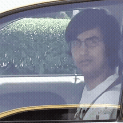 Man With Glasses Sitting In Car GIF