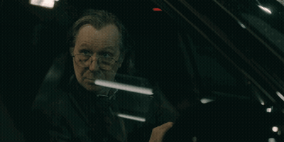 Man With Glasses Sitting In Dark Car GIF