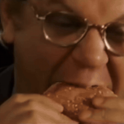 Man With Glasses Slight Smirk GIF