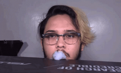 Man With Glasses Smoking Cigarette GIF