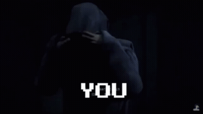 Man With Glasses Standing In Dark Room Monk GIF