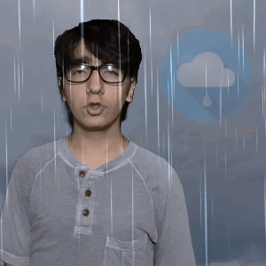 Man With Glasses Standing In Rain GIF