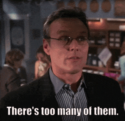 Man With Glasses Suit Saying Too Many Of Them GIF