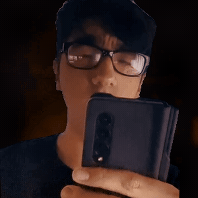 Man With Glasses Taking Selfie GIF
