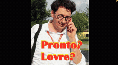 Man With Glasses Talking On Phone Saying Pronto Lovre GIF
