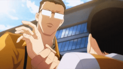 Man With Glasses Talking To Man In Front Of Building GIF