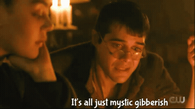 Man With Glasses Talks To Woman Saying It's All Just Mystic Gibberish GIF