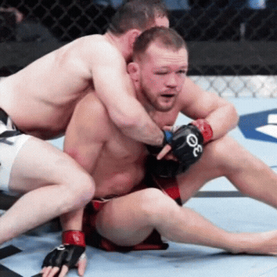 Man With Gloves Letter O Wrestling Another Man GIF