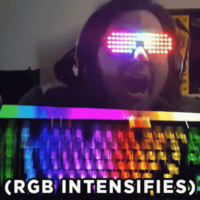 Man With Glowing Glasses At Rainbow Keyboard GIF