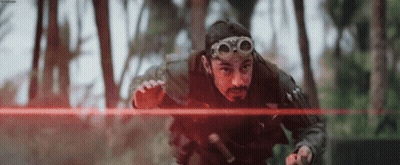 Man With Goggles And Beard Holding Red Laser GIF