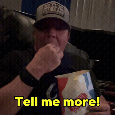 Man With Grand Ole Opry Hat Eating Popcorn GIF