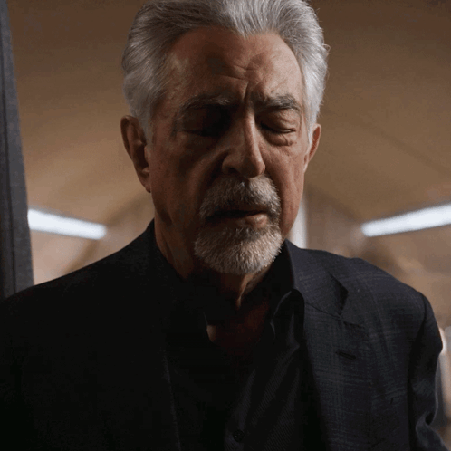Man With Gray Hair And Beard In Black Shirt And Suit GIF