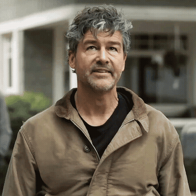 Man With Gray Hair And Beard In Brown Jacket GIF