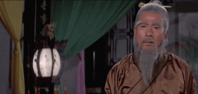 Man With Gray Hair And Beard In Brown Robe GIF