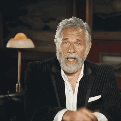 Man With Gray Hair And Beard Pointing At Camera GIF