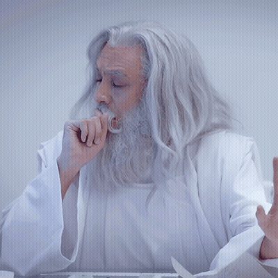 Man With Gray Hair And Beard Praying With Ay Above GIF