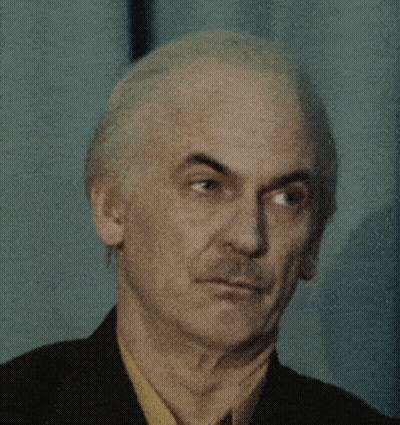 Man With Gray Hair In Black Suit GIF